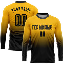 Load image into Gallery viewer, Custom Gold Black Sublimation Long Sleeve Fade Fashion Soccer Uniform Jersey
